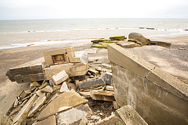 The Remains of the Godwin battery on the beach at Kilnsea at the head of Spurn point on Yorkshires East Coast, UK. Initially constructed during the First World War, the Godwin Battery was added to during the Second World War. It comprised of gun emplacements, search light, barracks, officers‚Äô mess, and a hospital. This section of coastline is the fastest eroding coastline in Europe. The soft boulder clay cliffs are easily eroded and have been eroding since Roman Times, but recently the climate change impacts of increased stormy weather, increased heavy rainfall events and sea level rise have accelerated the rate of erosion. The average rate of attrition is 1.5metres per year, last year it was 5 metres.