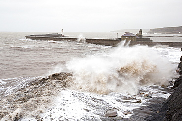 Whitehaven harbour during the January 2014 period of storm surge, high tides and storm force winds. The coastline took a battering, damaging the harbour wall and eroding a large section of coastal cliff.