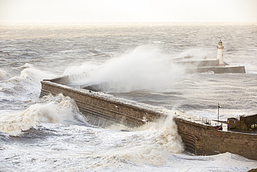 Storm waves from an extreme low pressure system batter Whitehaven harbour, Cumbria, UK, on the 10th December 2014.