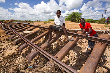 In mid January 2015, a three day period of excessive rain brought unprecedented floods to the small poor African country of Malawi. It displaced nearly quarter of a million people, devastated 64,000 hectares of land, and killed several hundred people. This shot shows a railway line that was washed away in Bangula.