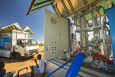 In mid January 2015, a three day period of excessive rain brought unprecedented floods to the small poor African country of Malawi. It displaced nearly quarter of a million people, devastated 64,000 hectares of land, and killed several hundred people. This shot shows a specialist truck that takes water straight from the river and purifies it to drinking standards, which is then used in the many flood refugee camps in the Shire valley.