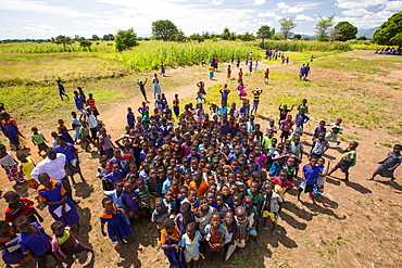 In mid January 2015, a three day period of excessive rain brought unprecedented floods to the small poor African country of Malawi. It displaced nearly quarter of a million people, devastated 64,000 hectares of land, and killed several hundred people. This shot shows displaced children in Baani refugee camp near Phalombe.