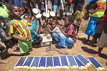 In mid January 2015, a three day period of excessive rain brought unprecedented floods to the small poor African country of Malawi. It displaced nearly quarter of a million people, devastated 64,000 hectares of land, and killed several hundred people. This shot shows solar powered lamps in a refugee camp near Chikwawa.