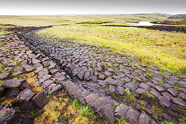 Peat cutting for fuel on the Isle of Lewis near Stornoway, Outer Hebrides, Scotland, UK.