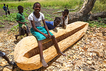 A traditional dug out canoe being constructed in Malawi, Africa.