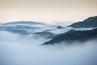 Morning Mist spilling down from the plateau into the lower shire river valley in Malawi, Africa.