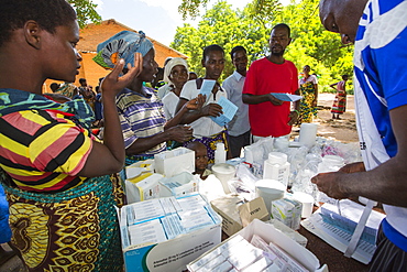 January 2015 saw a three day period of excessive rain which brought unprecedented floods to the small poor African country of Malawi. It displaced nearly quarter of a million people, devastated 64,000 hectares of land, and killed several hundred people. This shot shows A Medicin Sans Frontieres clinic in Makhanga providing Malaria treatment drugs to local people, many of whom now have malaria, as a result of the drying up flood waters providing ideal breeding grounds for mosquitoes.