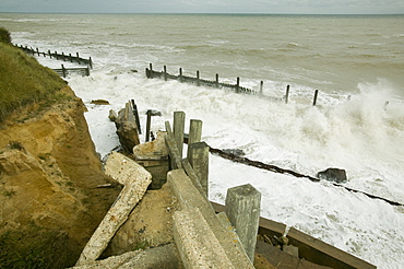 The lifeboat launching ramp destroyed as waves crashing against the coast at Happisburgh on the fastest eroding section of the UK coast, Norfolk, England, United Kingdom, Europe