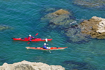 Sea kayaking off Port Isaac, Cornwall, England, United Kingdom, Europe