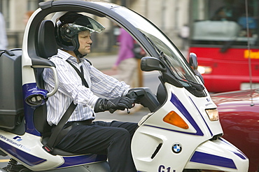 A motorcycle commuter in London, England, United Kingdom, Europe