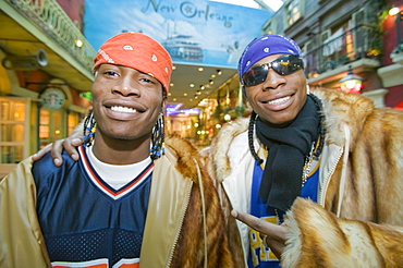 A fashion conscious couple of black men in the Trafford Centre in Manchester, England, United Kingdom, Europe