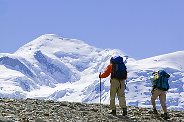 Hikers in front of Mont Blanc above Chamonix, Haute Savoie, France, Europe