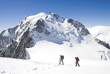 Climbers nearing the summit of the 4000 metre peak of Mont Blanc Du Tacul above Chamonix, Haute Savoie, France, Europe