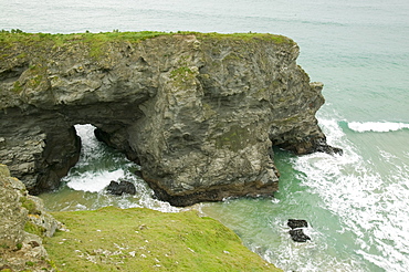 A sea arch at Bedruthan Steps in Cornwall, England, United Kingdom, Europe