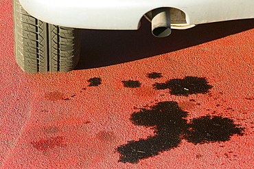 An oil leak in a car park