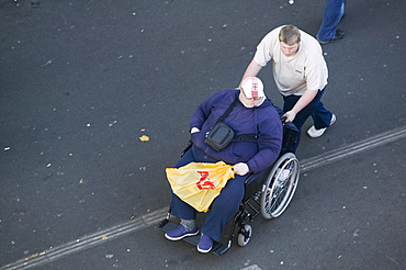 An obese disabled man in Leicester, Leicestershire, England, United Kingdom, Europe