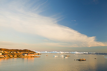 Colourful houses and hospital in Illulisat in the midnight sun on Greenland, Polar Regions