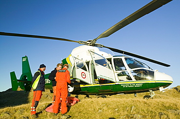 An air ambulance attending a mountain rescue in the Lake District, Cumbria, England, United Kingdom, Europe