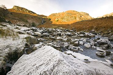 A partially frozen river in Easedale near Grasmere in the Lake District National Park, Cumbria, England, United Kingdom, Europe