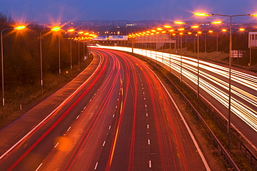 Car lights on the M1 motorway in Leicestershire, England, United Kingdom, Europe