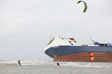 Kite surfers in front of The Riverdance, a ship washed ashore off Blackpool, Lancashire, England, United Kingdom, Europe