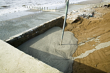 Repairing damage to the road between Allonby and Silloth caused by floods in 2008, Cumbria, England, United Kingdom, Europe