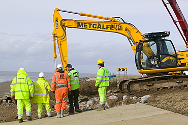 Repairing damage to the road between Allonby and Silloth caused by floods in 2008, Cumbria, England, United Kingdom, Europe