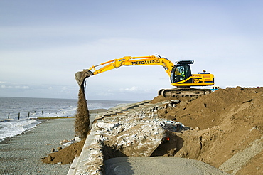 Repairing damage to the road between Allonby and Silloth caused by floods in 2008, Cumbria, England, United Kingdom, Europe