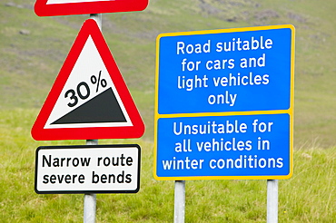 Road signs on Hardknott Pass in the Lake District, Cumbria, England, United Kingdom, Europe