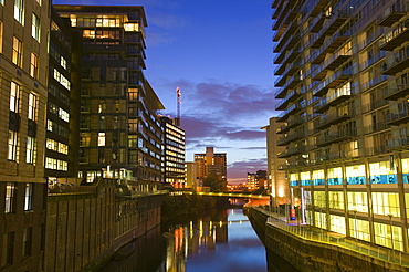 Modern luxury apartment blocks on the side of the River Irlam in Manchester city centre, England, United Kingdom, Europe