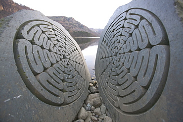 A split rock sculpture on Derwent Water, Keswick, Cumbria, England, United Kingdom, Europe