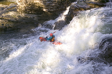 A canoeist on the River Kent near Kendal, Lake District, Cumbria, England, United Kingdom, Europe