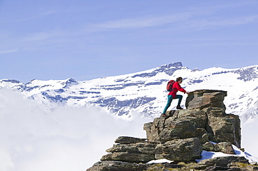 A woman climber in the Sierra Nevada mountains in Andalucia, Southern Spain, Europe