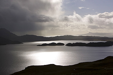 A shower passing over Loch Morar, looking towards Rhum, Scotland, United Kingdom, Europe