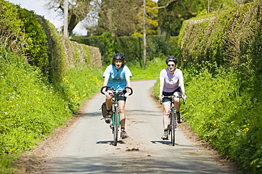 Women cycling on the Cheshire cycle way, England, United Kingdom, Europe