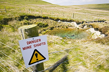 An abandoned mine shaft on the Caldbeck Fells in the Lake District, Cumbria, England, United Kingdom, Europe