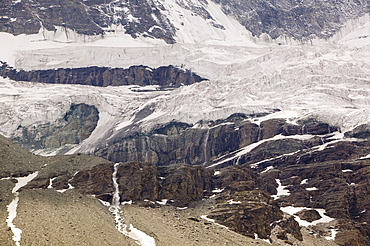 Melting glaciers on the north wall of the Matterhorn above Zermatt, Switzerland, Europe