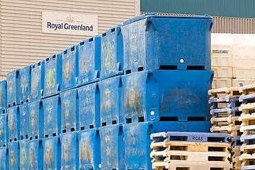 Plastic fish containers on the quayside at Ilulissat in Greenland, Polar Regions