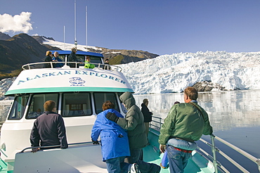 Tourists on a boat trip to the Aialick Glacier in Kenai Fjords National Park in Alaska, United States of America, North America