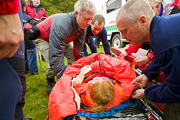 Langdale Ambleside Mountain Rescue Team stretcher an injured girl off Loughrigg in the Lake District, Cumbria, England, United Kingdom, Europe