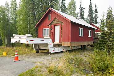 House in Fairbanks, moved after it started collapsing into the ground due to global warming induced permafrost melt, Alaska, United States of America, North America