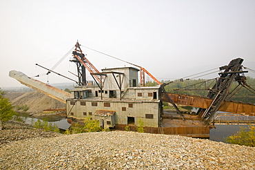 An abandoned gold dredger on the tundra near Fairbanks, Alaska, United States of America, North America