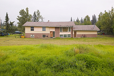 House collapsing due to global warming-induced permafrost melt, Fairbanks, Alaska, United States of America, North America