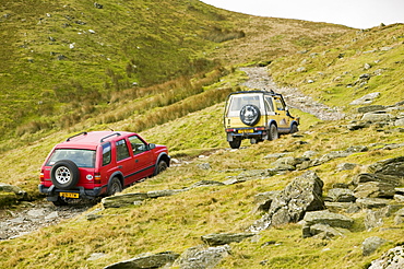 Off road vehicles on the Walna Scar road above Coniston in the Lake District, Cumbria, England, United Kingdom, Europe