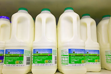 Organic milk in a Tesco supermarket in Carlisle, Cumbria, England, United Kingdom, Europe