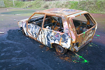 A burnt out stolen car abandoned in Liverpool, Merseyside, England, United Kingdom, Europe