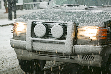 A car in the snow in Ambleside, Cumbria, England, United Kingdom, Europe