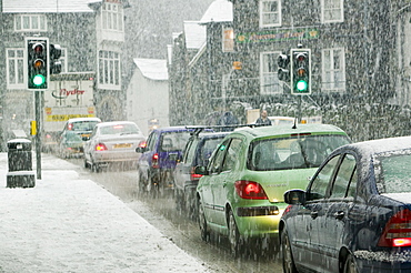 A car in the snow in Ambleside, Cumbria, England, United Kingdom, Europe