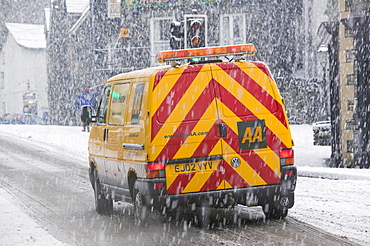 An AA van in the snow in Ambleside, Cumbria, England, United Kingdom, Europe