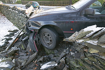 A car skidded and crashed on ice in Ambleside in the Lake District, Cumbria, England, United Kingdom, Europe